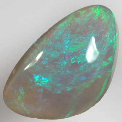 SOLID SEMI BLACK OPAL Sparkles of green over blue